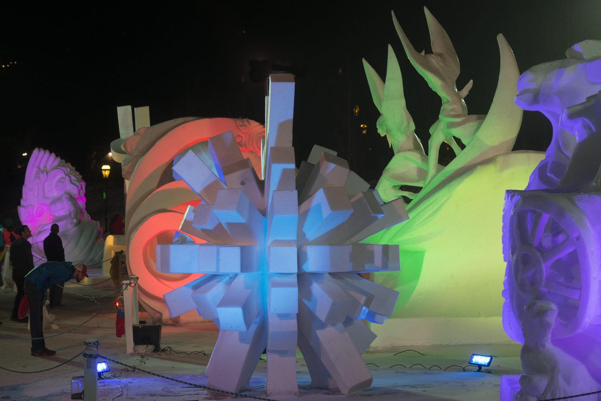 Sculptures lit at night during the International Snow Sculpture Championships